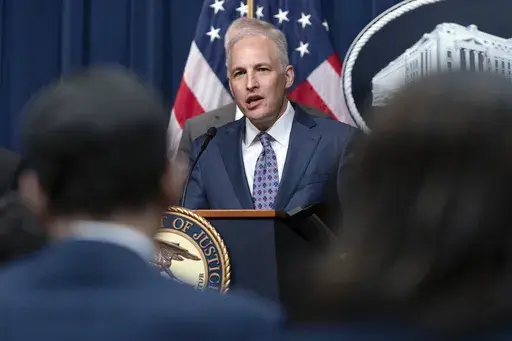 Assistant Attorney General Matthew Olsen of the Justice Department's National Security Division speaks during a news conference at the Department of Justice in Washington, May 16, 2023. With just seven weeks until the end of the year, the Biden administration is running out of time to win the reauthorization of a spy program it says is vital to preventing terrorism, catching spies and disrupting cyberattacks. The tool is called Section 702 of the Foreign Intelligence Surveillance Act. (AP Photo/