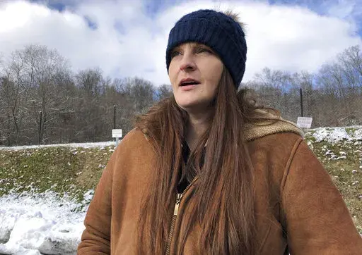 Sarah Kelly is shown Friday, Jan. 21, 2022, in Huntington, W.Va. After struggling with an opioid addiction most of her life, Kelly has been in recovery since October 2019. As a federal judge mulls a decision in a lawsuit filed by the city of Huntington and Cabell County over the role of three pharmaceutical companies in the local opioid crisis, Kelly said there are many recovery programs that could benefit if the plaintiffs prevail. (AP Photo/John Raby)