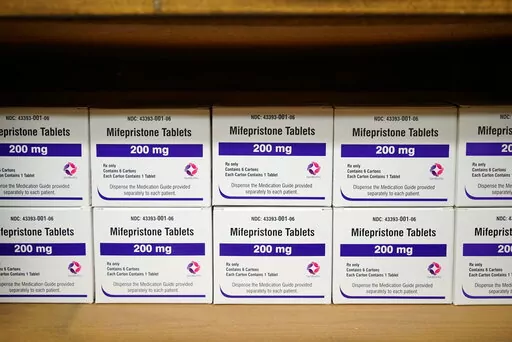 Boxes of the drug mifepristone line a shelf at the West Alabama Women's Center in Tuscaloosa, Ala., on Wednesday, March 16, 2022. The drug is one of two used together in "medication abortions."   On Friday, June 17,  The Associated Press reported on stories circulating online incorrectly claiming medication abortions are dangerous.  (AP Photo/Allen G. Breed, File)