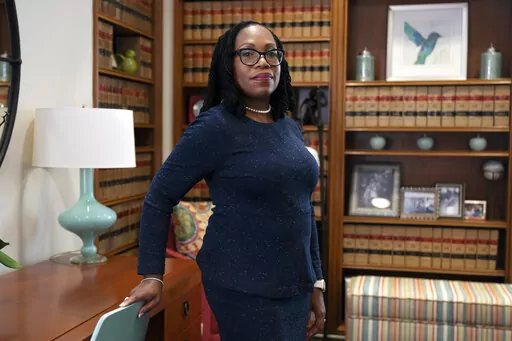 Judge Ketanji Brown Jackson, a U.S. Circuit Judge on the U.S. Court of Appeals for the District of Columbia Circuit, poses for a portrait, Feb., 18, 2022, in her office at the court in Washington. Jackson's Supreme Court nomination confirmation hearing starts March 21. If confirmed, she would be the court's first Black female justice. (AP Photo/Jacquelyn Martin, File)
