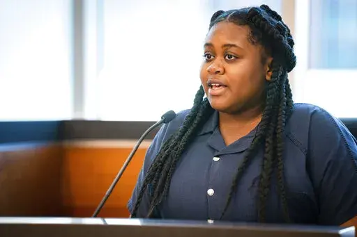 Pieper Lewis gives her allocution during a sentencing hearing, Tuesday, Sept. 13, 2022, in Des Moines, Iowa. Iowa authorities say Lewis, an 18-year-old sex trafficking victim who pleaded guilty to killing a man she said raped her escaped from a women's center where she was serving her probation sentence. Lewis was seen walking out of the building at the Fresh Start Women's Center in Des Moines shortly after 6:15 a.m. Friday, Nov. 4, 2022. (Zach Boyden-Holmes/The Des Moines Register via AP, File)