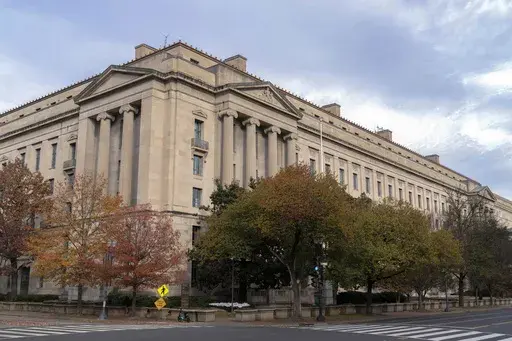 The U.S. Department of Justice building is seen in Washington, Dec. 7, 2024. (AP Photo/Jose Luis Magana, File)