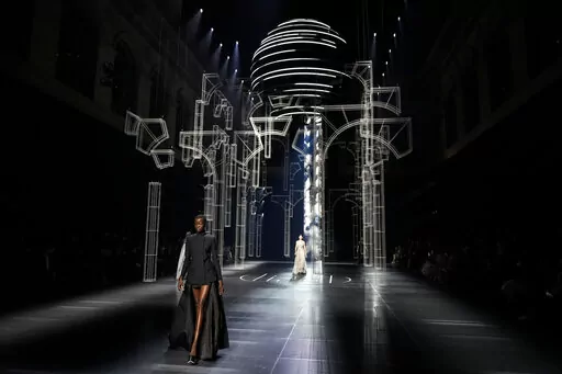A model wears a creation for the Fendi Spring-Summer 2022 Haute Couture fashion collection, in Paris, Thursday, Jan. 27, 2022. (AP Photo/Thibault Camus)