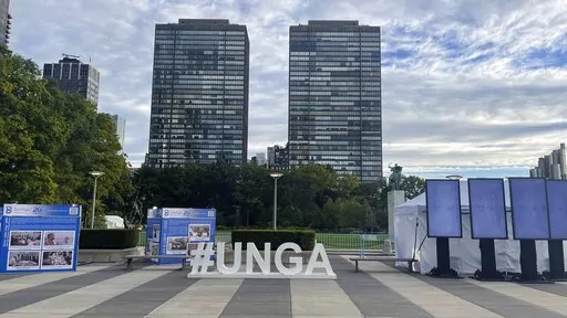 A "#UNGA" sign is on display at the United Nations Headquarters on Saturday, Sept. 24, 2022.    The United Nations, like many large institutions, has its own language. For the dignitaries, bureaucrats, journalists and officials who walk these halls regularly, this alphanumeric soup has meaning and perhaps even facilitates communication. (AP Photo/Ted Anthony)