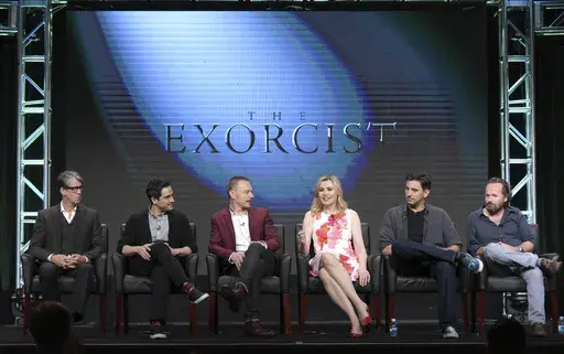 Alan Ruck, from left, Alfonso Herrera, Ben Daniels, Geena Davis, creator/executive producer Jeremy Slater and executive producer/director Rupert Wyatt participate in the panel for "The Exorcist" during the Fox Television Critics Association summer press tour, Aug. 8, 2016, in Beverly Hills, Calif. (Photo by Richard Shotwell/Invision/AP, File)