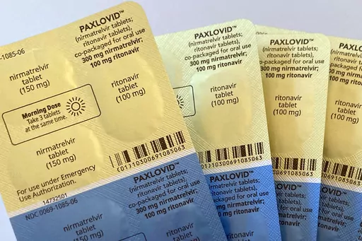 Doses of the anti-viral drug Paxlovid are displayed in New York, on Monday, Aug. 1, 2022. The COVID-19 medication won another vote of confidence from U.S. health advisors on Thursday, March 16, 2023, clearing the way for its full regulatory approval after being used by millions of Americans under emergency use. (AP Photo/Stephanie Nano, File)