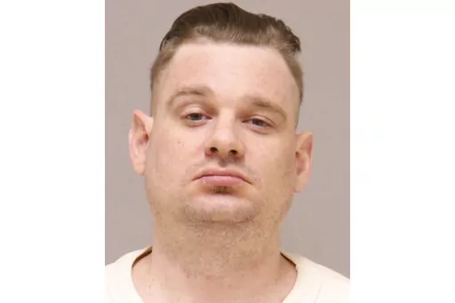 This image provided by the Kent County, Mich., Jail. shows Adam Fox. The attorney for Fox, the leader of a plot to kidnap Michigan Gov. Gretchen Whitmer says his client should not be sentenced to life in prison because prosecutors overstated his role in the plot and have created a “false narrative of a terrifying para-military leader." Attorney Christopher Gibbons said Friday, Dec. 9, 2022 in Fox's sentencing memorandum that the government had employed “histrionic descriptions” of Fox to o