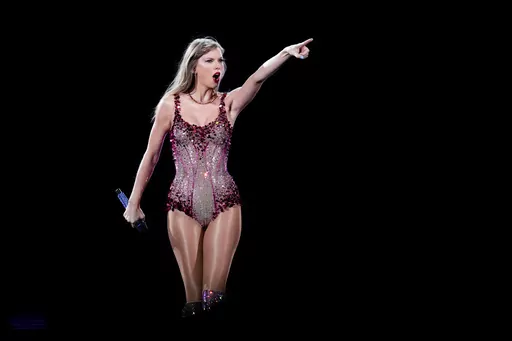 Taylor Swift performs at the Monumental stadium during her Eras Tour concert in Buenos Aires, Argentina, Nov. 9, 2023. Universal Music Group, which represents artists including Taylor Swift, Drake, Adele, Bad Bunny and Billie Eilish, says that it will no longer allow its music on TikTok now that a licensing deal between the two parties has expired. (AP Photo/Natacha Pisarenko, File)