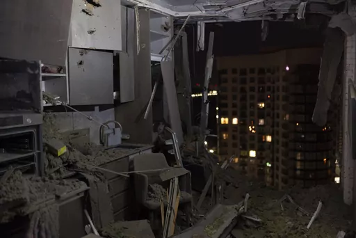 A damaged apartment is seen in Kyiv, Ukraine, Thursday, July 13, 2023, following Russia's air attacks targeting the capital city. (AP Photo/Jae C. Hong)