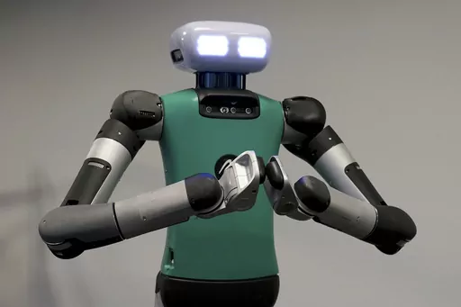 Agility Robotics' robot Digit performs gestures at the company's office in Pittsburgh, Wednesday, Aug. 16, 2023. Agility co-founder Jonathan Hurst said, “We’re trying to make robots that can operate in human spaces.” (AP Photo/Matt Freed)