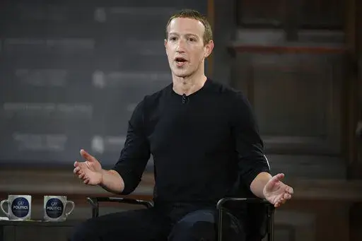 Facebook CEO Mark Zuckerberg speaks at Georgetown University in Washington, Thursday, Oct. 17, 2019. Facebook parent Meta is laying off 11,000 people, about 13% of its workforce, as it contends with faltering revenue and broader tech industry woes, Zuckerberg said in a letter to employees Wednesday. (AP Photo/Nick Wass, File)
