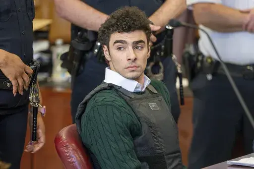 Luigi Mangione , accused of fatally shooting the UnitedHealthcare CEO Brian Thompson in New York City and leading authorities on a five-day search is scheduled, appears in court for a hearing, Friday, Feb. 21, 2025, in New York. (Steven Hirsch/New York Post via AP, Pool, File)