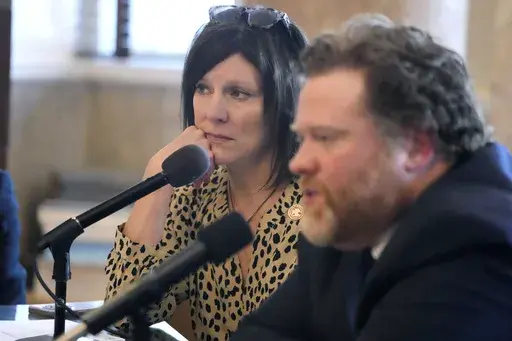 Mississippi House Medicaid Committee Chairwoman Missy McGee, R-Hattiesburg, left, listens as Drew Snyder, executive director of the Mississippi Division of Medicaid, speaks at the state Capitol, Feb. 7, 2024, in Jackson, Miss. A new "presumptive eligibility" law that takes effect Monday, July 1, 2024, allows earlier Mississippi Medicaid coverage during pregnancy. The law says Medicaid will pay for a pregnant woman’s outpatient medical care up to 60 days while her application for the government