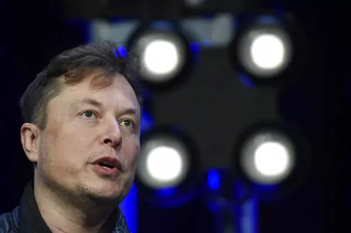 Elon Musk speaks at the SATELLITE Conference and Exhibition March 9, 2020, in Washington.  A federal judge in New York has denied Musk's request to scrap his settlement with securities regulators over 2018 tweets about having the money to take Tesla private. Judge Lewis Liman on Wednesday, April 27, 2022,  also denied a motion to nullify subpoenas of Musk seeking information about possible violations of his settlement with the Securities and Exchange Commission.(AP Photo/Susan Walsh, File)