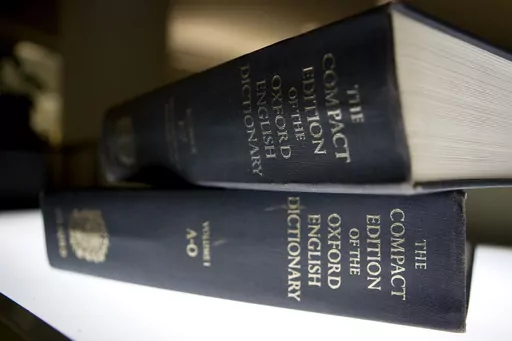 An Oxford English Dictionary is shown at the headquarters of the Associated Press in New York, Aug. 29, 2010. Oxford University Press has named “rizz″ as its word of the year, highlighting the popularity of a term used by Generation Z to describe someone’s ability to attract or seduce another person. The four finalists were selected by a public vote and the winner was announced on Monday Dec. 4, 2023. (AP Photo/Caleb Jones, File)