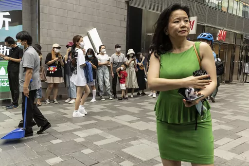 Cheng Lei, a Chinese-born Australian journalist for CGTN, the English-language channel of China Central Television, attends a public event in Beijing on Aug. 12, 2020. In 2022, Chinese-born Australian journalist Cheng Lei was tried in China on national security charges but has yet to learn the verdict, Australian Foreign Minister Penny Wong said in March. (AP Photo/Ng Han Guan, File)