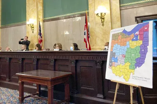 Members of the Ohio Senate Government Oversight Committee hear testimony on a new map of state congressional districts in this file photo from Nov. 16, 2021, at the Ohio Statehouse in Columbus, Ohio. The surprising advantage Democrats gained during the torturous process of rewriting the nation’s congressional maps may be short lived. North Carolina and Ohio are already poised to redraw their maps in the next few years. (AP Photo/Julie Carr Smyth, File)
