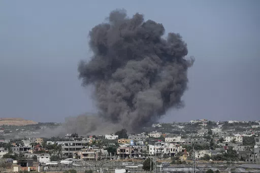 Smoke rises following an Israeli airstrike in Rafah, Gaza Strip, Thursday, May 30, 2024. (AP Photo/Abdel Kareem Hana)