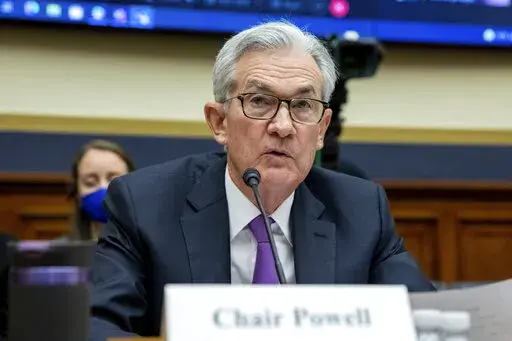 Federal Reserve Chairman Jerome Powell speaks to lawmakers during a House Committee on Financial Services hearing on Capitol Hill in Washington, Dec. 1, 2021. With inflation surging, unemployment falling and wages rising, some economists are warning that the Federal Reserve may have waited too long to reverse its ultra-low-rate policies — a delay that could put the economy at heightened risk. (AP Photo/Amanda Andrade-Rhoades)