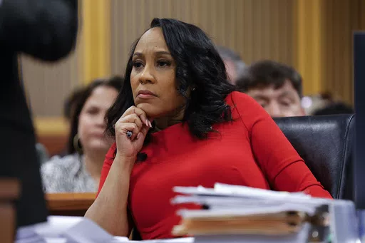 Fulton County District Attorney Fani Willis looks on during a hearing on the Georgia election interference case, March, 1, 2024, in Atlanta. A Georgia appeals court has agreed to review a lower court ruling allowing Fani Willis to continue to prosecute the election interference case she brought against Donald Trump. (AP Photo/Alex Slitz, Pool)