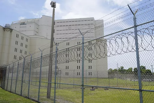The Palm Beach County Main Detention Center is pictured on June 4, 2021, in West Palm Beach, Fla. Republican lawmakers in Florida and other states are pushing to increase the use of cash bail and pretrial detention. (AP Photo/Wilfredo Lee, File)
