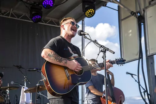 Zach Bryan performs at the Railbird Music Festival on Sunday, Aug. 29, 2021, in Lexington, Ky. The chorus against Ticketmaster's contentious concert pricing practices is growing, numbering among them Zach Bryan and friends.The country music artist dropped a live album, “All My Homies Hate Ticketmaster,” on Sunday, Dec. 25, 2022. With it came a statement posted to social media in which he decried “a massive issue with fair ticket prices to live shows lately.” (Photo by Amy Harris/Invision