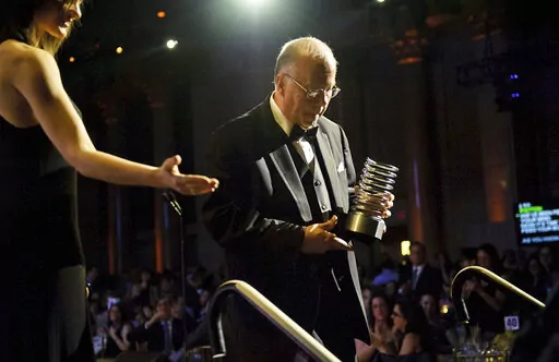 This photo provided by Webby Awards, Stephen Wilhite accepts his Webby lifetime achievement award on May 2013 in New York.  Wihite, he inventor of the internet-popular short-video format, the GIF, has died.   His wife, Kathaleen, said Thursday, March 24, 2022, in a phone interview that he died of COVID on March 14.     (Webby Awards via AP)