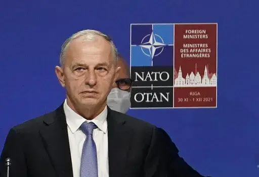 NATO Deputy General Secretary attends the NATO Foreign Ministers meeting in Riga, Latvia, Tuesday, Nov. 30, 2021. NATO's deputy general secretary has said in an interview with The Associated Press that Russian President Vladimir Putin’s month-old “barbaric war” against Ukraine is a war he cannot win. Mircea Geoana said that NATO would be “forced to take appropriate measures” in the event of a chemical or nuclear attack, which follows a string of ominous comments from Moscow officials w