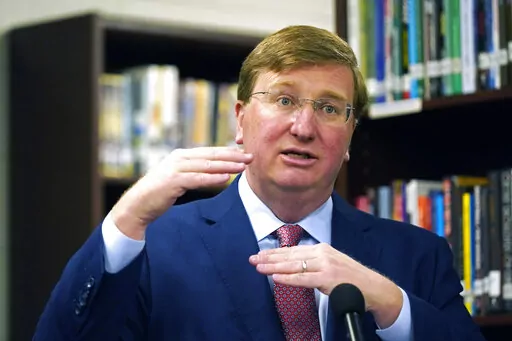 Mississippi Gov. Tate Reeves speaks about the importance of his signing a teacher pay raise bill, Thursday, March 31, 2022, at Madison Central High School in Madison, Miss. (AP Photo/Rogelio V. Solis)