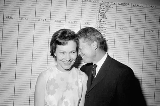 In this Sept. 15, 1966, file photo, then Georgia State Sen. Jimmy Carter hugs his wife, Rosalynn, at his Atlanta campaign headquarters. Rosalynn Carter turns 96 on Friday, Aug. 18, 2023 and is celebrating at home in Plains, Ga., with her family, including former President Jimmy Carter. Her plan includes eating cupcakes and peanut butter ice cream, then releasing butterflies in her garden -- with friends doing the same around the Carters' hometown. (AP Photo/File)