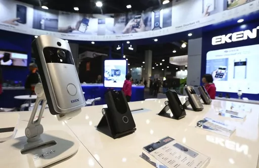 An EKEN doorbell camera, along with other models, are shown on display at CES International, Jan. 10, 2019, in Las Vegas. Some doorbell cameras sold by Amazon and other online retailers have security flaws that could allow bad actors to view footage from the devices or control them completely, according to an investigation published Thursday, Feb. 29, 2024, by Consumer Reports. (AP Photo/Ross D. Franklin, File)