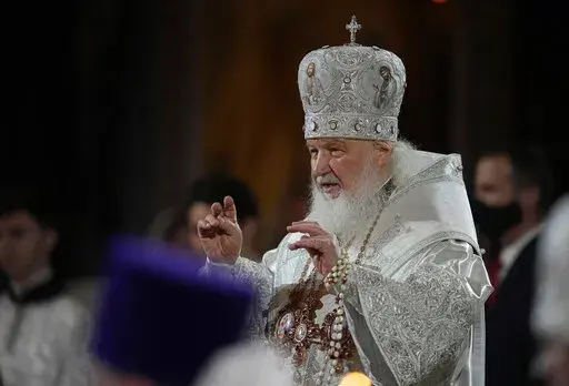 Russian Orthodox Church Patriarch Kirill conducts the Easter service in the Christ the Savior Cathedral in Moscow, Russia, April 24, 2022. Britain has announced a new round of sanctions against Russia. Those targeted include Patriarch Kirill, head of the Russian Orthodox Church, who Britain said “repeatedly abused his position to justify” Russia's war on Ukraine. (AP Photo/Alexander Zemlianichenko, Pool, File)