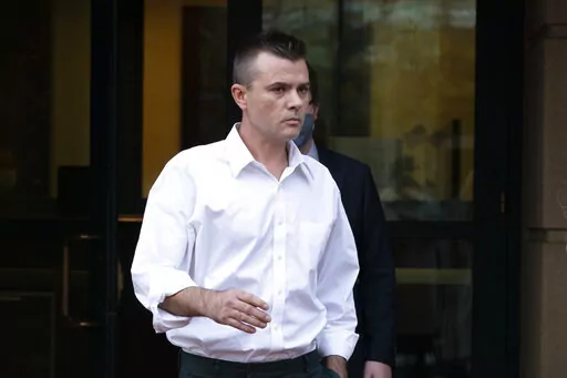 Igor Danchenko leaves the Albert V. Bryan United States Courthouse in Alexandria, Va., Nov. 4, 2021. Danchenko, a think tank analyst who played a major role in the creation of a flawed report about former President Donald Trump, is scheduled to go on trial Tuesday, Oct. 11, 2022, for lying to the FBI about how he developed information that went into what is now infamously known as the “Steele dossier.” (AP Photo/Manuel Balce Ceneta, File)