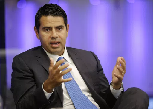 In this Tuesday, Aug. 20, 2013 photo, Cesar Conde speaks about the Fusion tv network during a tour of the facilities in Miami. Most news organizations hold its journalists to strict ethical standards to avoid conflicts of interest either real or perceived. Is the same true for its bosses? Outside corporate positions held by NBC Universal News Group chief Cesar Conde and CNN boss Mark Thompson reveal an ethical issue that has received little discussion. Should people who supervise news organizati