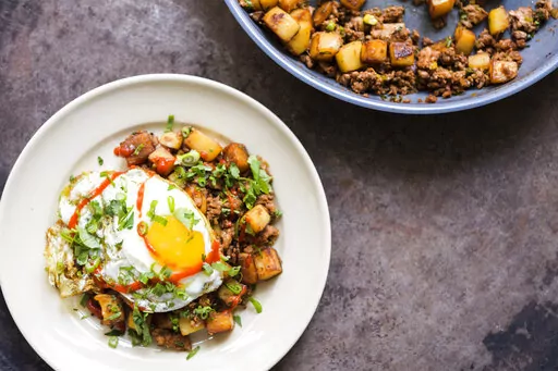This image released by Milk Street shows a recipe for Macanese Meat-and-Potato Hash. (Milk Street via AP)