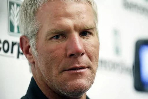 Former NFL quarterback Brett Favre speaks with reporters prior to his induction to the Mississippi Hall of Fame in Jackson, Miss., Aug. 1, 2015. The Mississippi Supreme Court said Wednesday, Aug. 9, 2023, that it will not remove Favre as a defendant in a civil lawsuit that seeks to recover millions of dollars of misspent welfare money meant to help some of the poorest people in the United States. (AP Photo/Rogelio V. Solis, File)