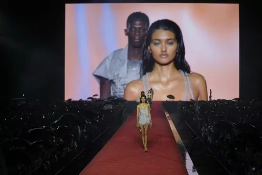 A model wears a creation as part of the Diesel women's Spring Summer 2024 collection presented in Milan, Italy, Wednesday, Sept. 20, 2023. (AP Photo/Luca Bruno)