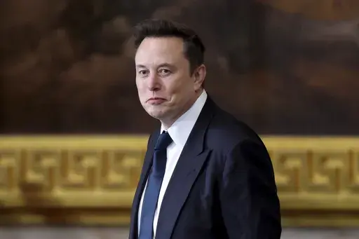 Elon Musk arrives before the 60th Presidential Inauguration in the Rotunda of the U.S. Capitol in Washington, Monday, Jan. 20, 2025. (Kevin Lamarque/Pool Photo via AP, File)