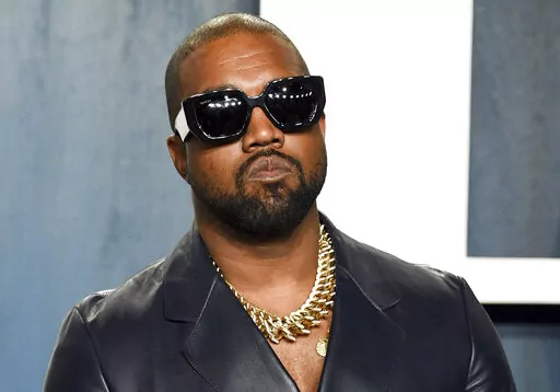 Kanye West arrives at the Vanity Fair Oscar Party on  Feb. 9, 2020, in Beverly Hills, Calif. West, who goes by Ye, is ending the contract between his company Yeezy and the struggling clothing retailer, confirmed his lawyer in an emailed statement to The Associated Press Thursday, Sept. 15, 2022. (Photo by Evan Agostini/Invision/AP, File)