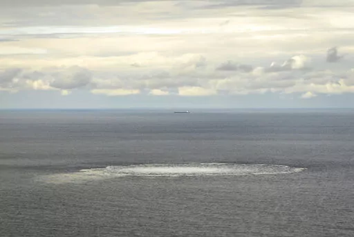In this photo provided by the Armed Forces of Denmark, a view the disturbance in the water above the gas leak,  in the Baltic Sea, Thursday, Sept. 29, 2022. Following the suspected sabotage this week of the Nord Stream 1 and 2 pipelines that carry Russian natural gas to Europe, there were two leaks off Sweden, including a large one above North Stream 1, and a smaller one above North Stream 2.  (Rune Dyrholm/Armed Forces of Denmark via AP)