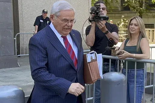 U.S. Sen. Bob Menendez, D-N.J., leaves federal court following the day's proceedings in his bribery trial, Friday, June 28, 2024, in New York. Prosecutors rested on Friday after presenting evidence for seven weeks at the bribery trial of Menendez, enabling the Democrat and two New Jersey businessmen to begin calling their own witnesses next week to support defense claims that no crimes were committed and no bribes were paid. (AP Photo/Larry Neumeister)