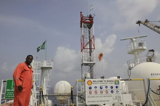 A member of Shell staff on the Bonga offshore oil Floating Production Storage and Offloading vessel off the coast of the Niger Delta in Nigeria, Monday, Dec. 26, 2011. Shell said Tuesday, Jan. 16, 2024 it agreed to sell its onshore business in Nigeria’s Niger Delta to a consortium of companies in a deal worth $2.4 billion, the latest move by the energy company to limit its exposure in the West African nation amid long-running complaints of environmental pollution caused by the oil industry. (A