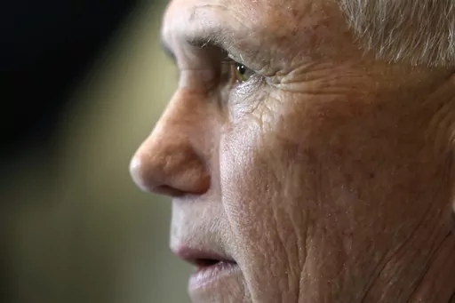 Former Vice President Mike Pence speaks with reporters after signing papers to get on the Republican presidential primary ballot at the New Hampshire Statehouse, Friday, Oct. 13, 2023, in Concord, N.H. Pence ended September with just $1.18 million left in his campaign account, a strikingly low number for a presidential contest and far less than his rivals, new filings show. His campaign also has $621,000 in debt — more than half the cash he had remaining — and is scrambling to meet donor thr