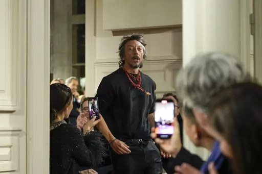 Designer Pierpaolo Piccioli accepts applause for the Valentino Haute Couture Spring-Summer 2024 collection presented in Paris, on Jan. 24, 2024. Valentino’s longtime creative director, Pierpaolo Piccioli, has announced his departure from the storied Italian fashion house. In an emotional statement shared Friday on Instagram, Piccioli reflected on his 25-year tenure with the brand, thanking co-founders Valentino Garavani and Giancarlo Giammetti and the team that contributed to the brand’s suc