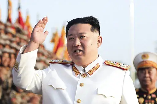 In this photo provided by the North Korean government, North Korean leader Kim Jong Un acknowledges the officers and soldiers who took part in a celebration the 90th founding anniversary of the Korean People's Revolutionary Army, in North Korea on April 27, 2022. Independent journalists were not given access to cover the event depicted in this image distributed by the North Korean government. The content of this image is as provided and cannot be independently verified. Korean language watermark