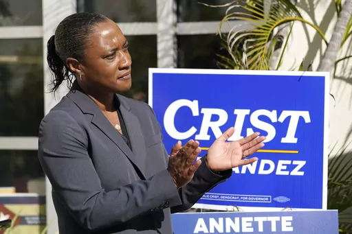 Laphonza Butler, president of EMILY's List, listens during a rally held by the Latino Victory Fund, Oct. 20, 2022, in Coral Gables, Fla. A spokesman in California Gov. Gavin Newsom's office said on Sunday, Oct. 1, 2023, that he will name Butler to the Senate seat of the late Dianne Feinstein. (AP Photo/Lynne Sladky, File)