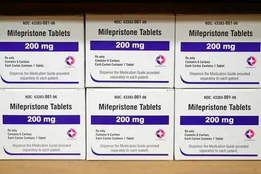 Boxes of the drug mifepristone sit on a shelf at the West Alabama Women's Center in Tuscaloosa, Ala., on March 16, 2022. Lawsuits have been filed in West Virginia and North Carolina challenging the states' restrictions on the use of abortion pills. (AP Photo/Allen G. Breed, File)