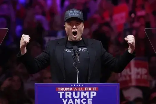 Elon Musk speaks before Republican presidential nominee former President Donald Trump at a campaign rally at Madison Square Garden, Sunday, Oct. 27, 2024, in New York. (AP Photo/Evan Vucci, File)