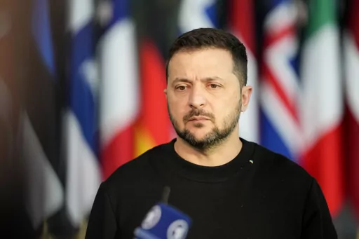 Ukraine's President Volodymyr Zelenskyy addresses a media conference prior to a meeting of NATO defense ministers at NATO headquarters in Brussels, Wednesday, Oct. 11, 2023. On Friday, Oct. 13, The Associated Press reported on stories circulating online incorrectly claiming a video shows a BBC News report confirming Ukraine provided weapons to Hamas. (AP Photo/Virginia Mayo, File)