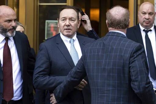 Actor Kevin Spacey leaves court following the day's proceedings in a civil trial, Thursday, Oct 6, 2022, in New York, accusing him of sexually abusing a 14-year-old actor in the 1980s when he was 26. (AP Photo/Yuki Iwamura)